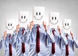 Business people with happy face posters